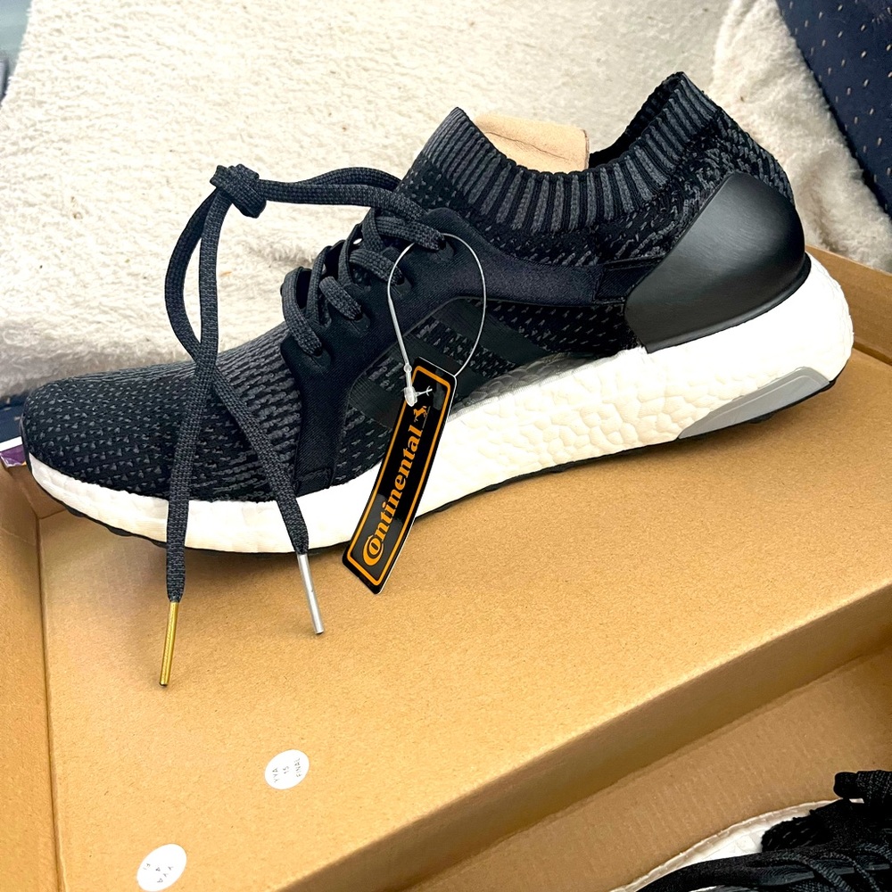 Size 11 women’s Adidas Ultraboost X. Never worn, new with tags. Black.